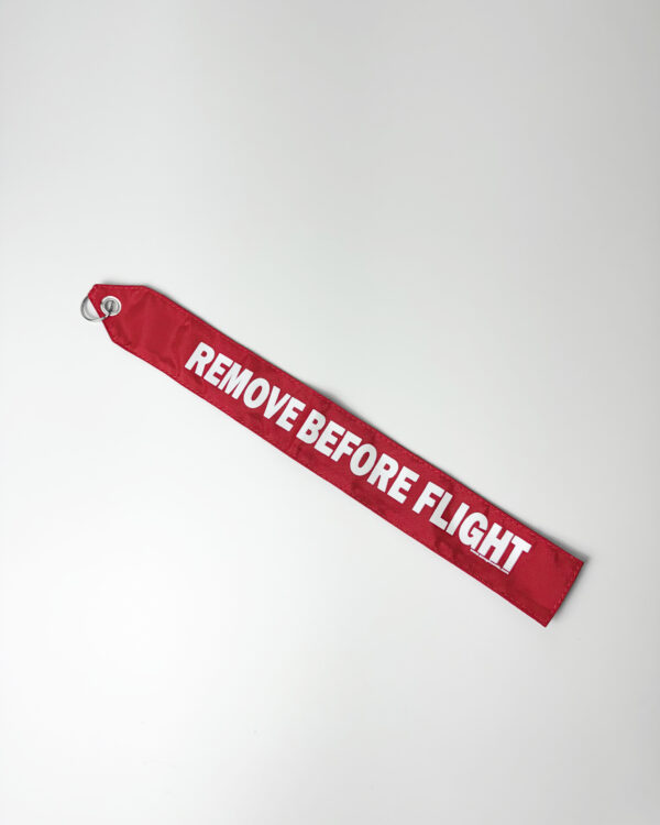 Remove before flight streamer rojo